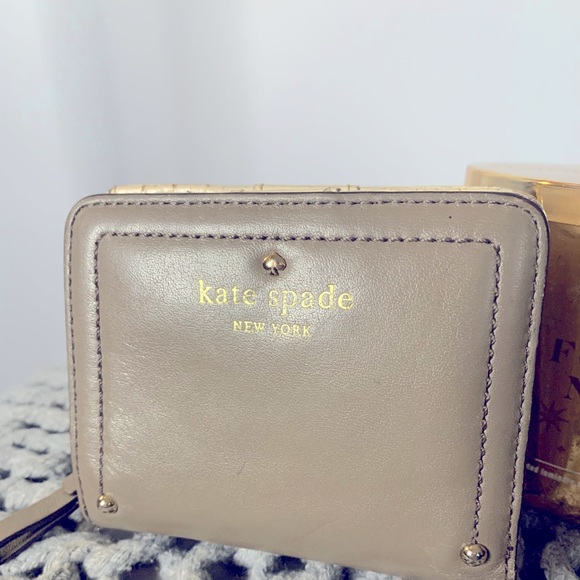 kate spade Handbags - Kate Spade Wallet Tan and Cream inside, 4 x 4 with coin, credit card, cash area.